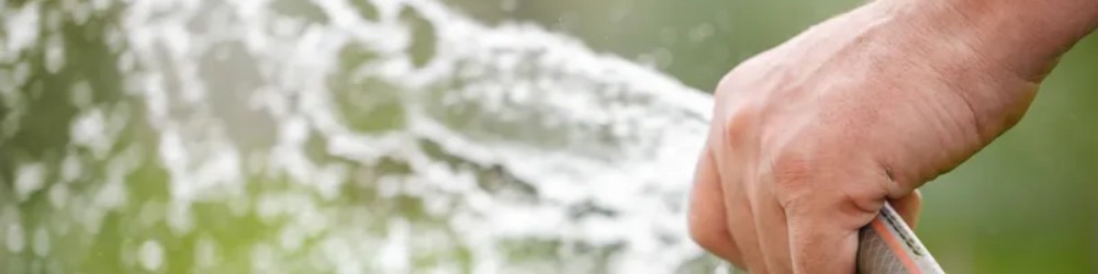 cool off artificial grass with water